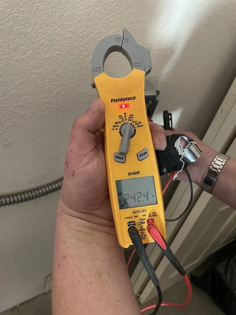 Voltage testing with clamp meter during Whole House Surge Protector in McLoud